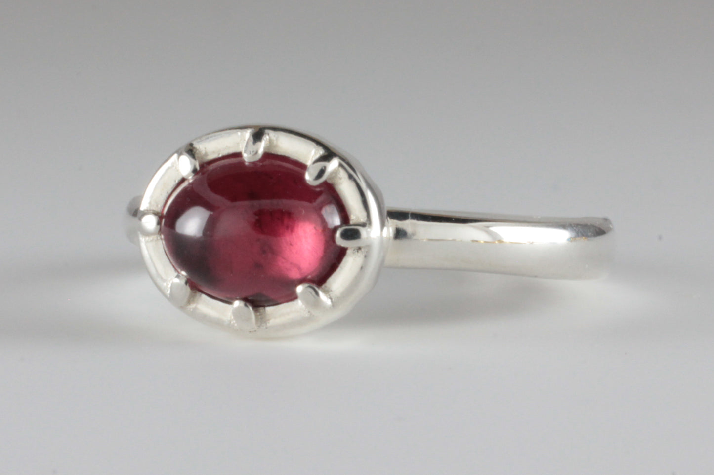 Cutdown 8-claw Georgian style Oval Garnet Cabochon Ring