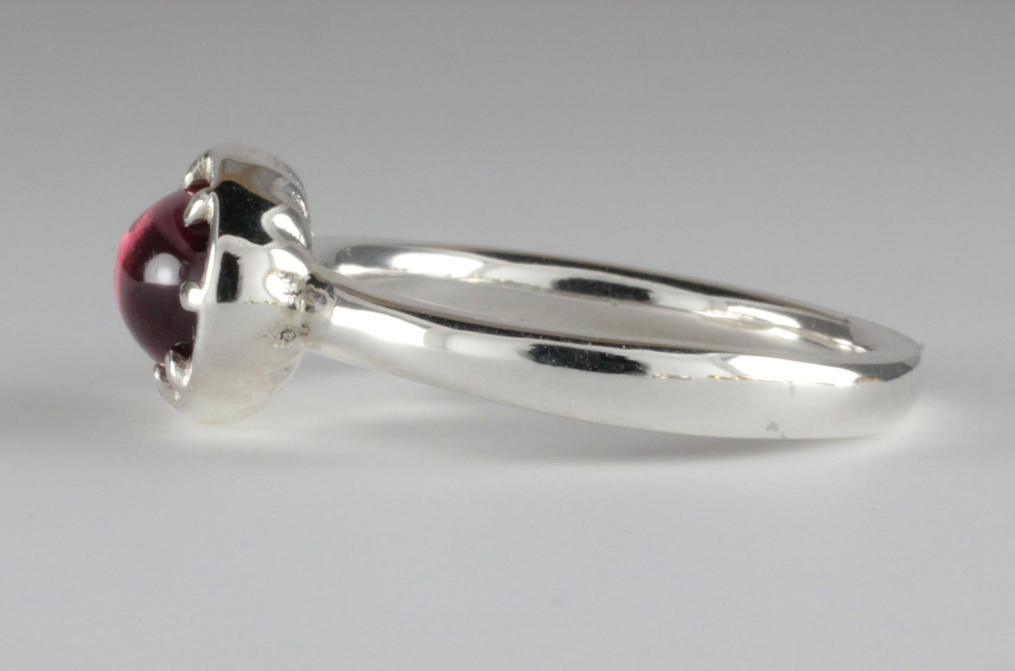 Cutdown 8-claw Georgian style Oval Garnet Cabochon Ring