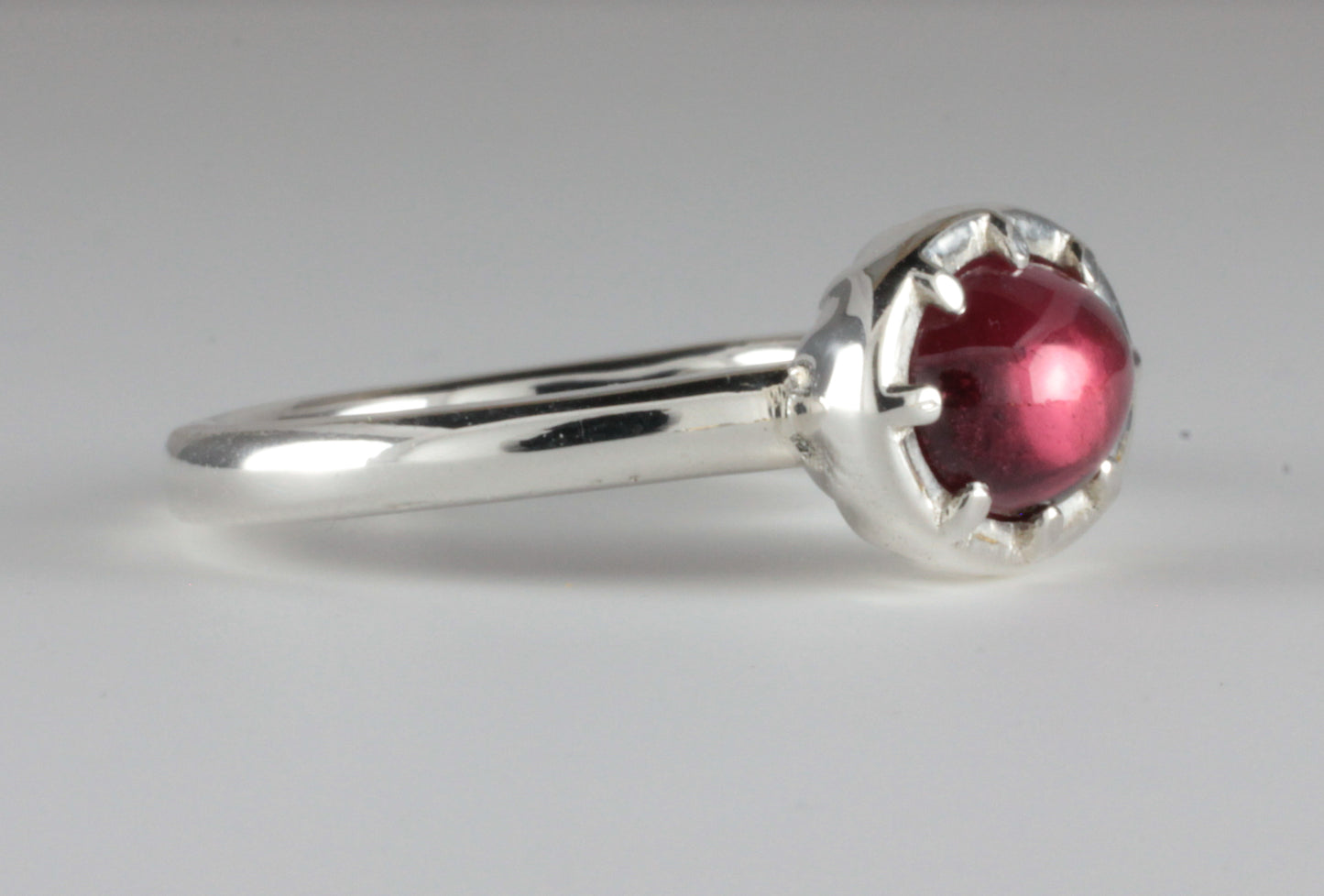 Cutdown 8-claw Georgian style Oval Garnet Cabochon Ring