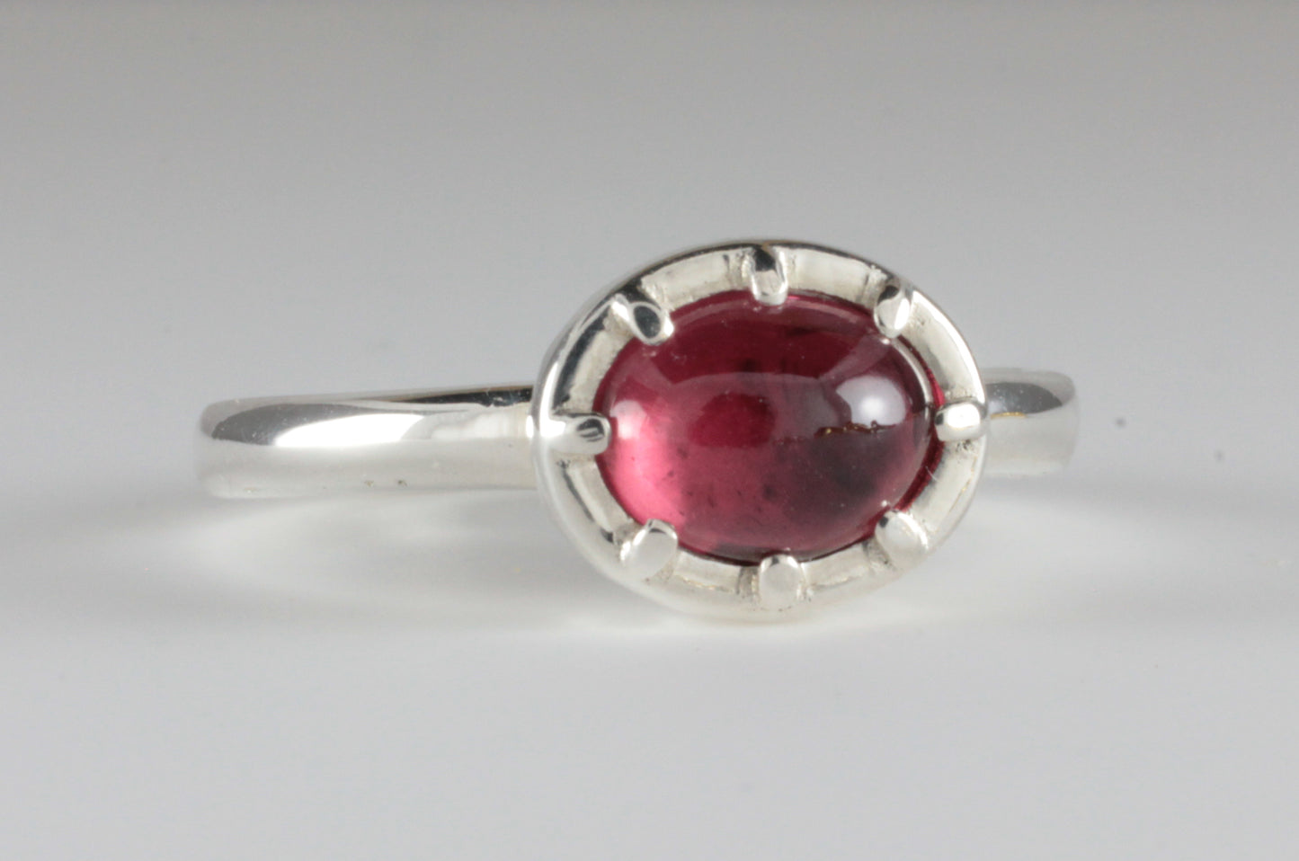 Cutdown 8-claw Georgian style Oval Garnet Cabochon Ring