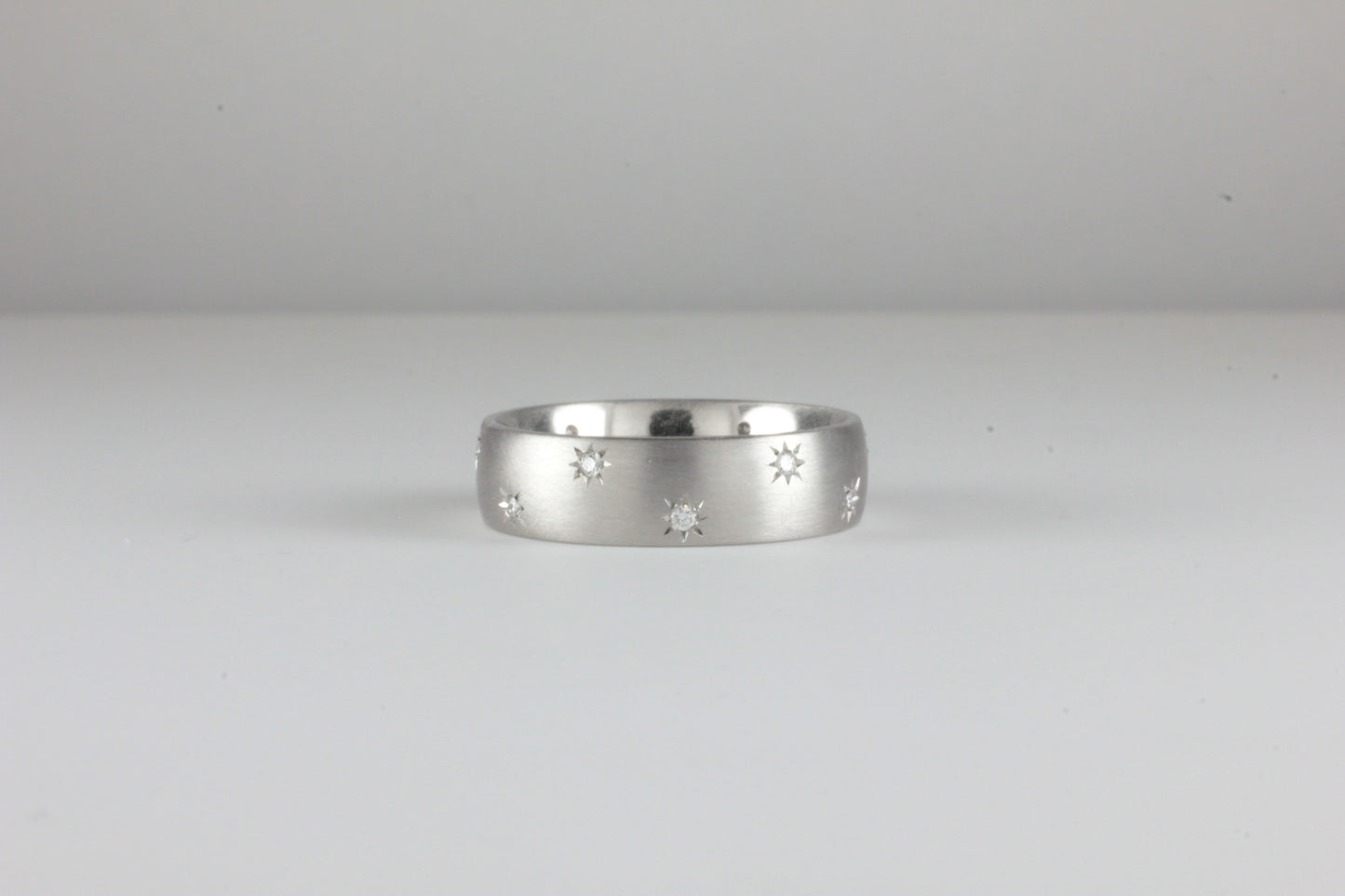 Platinum Staggered Fully Star Set Diamond band