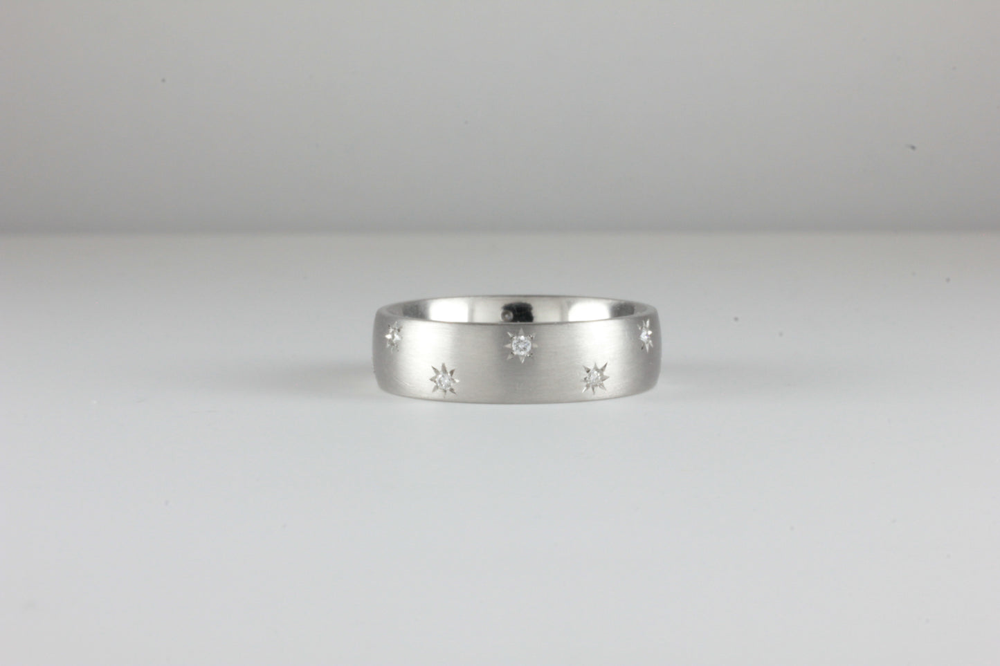 Platinum Staggered Fully Star Set Diamond band