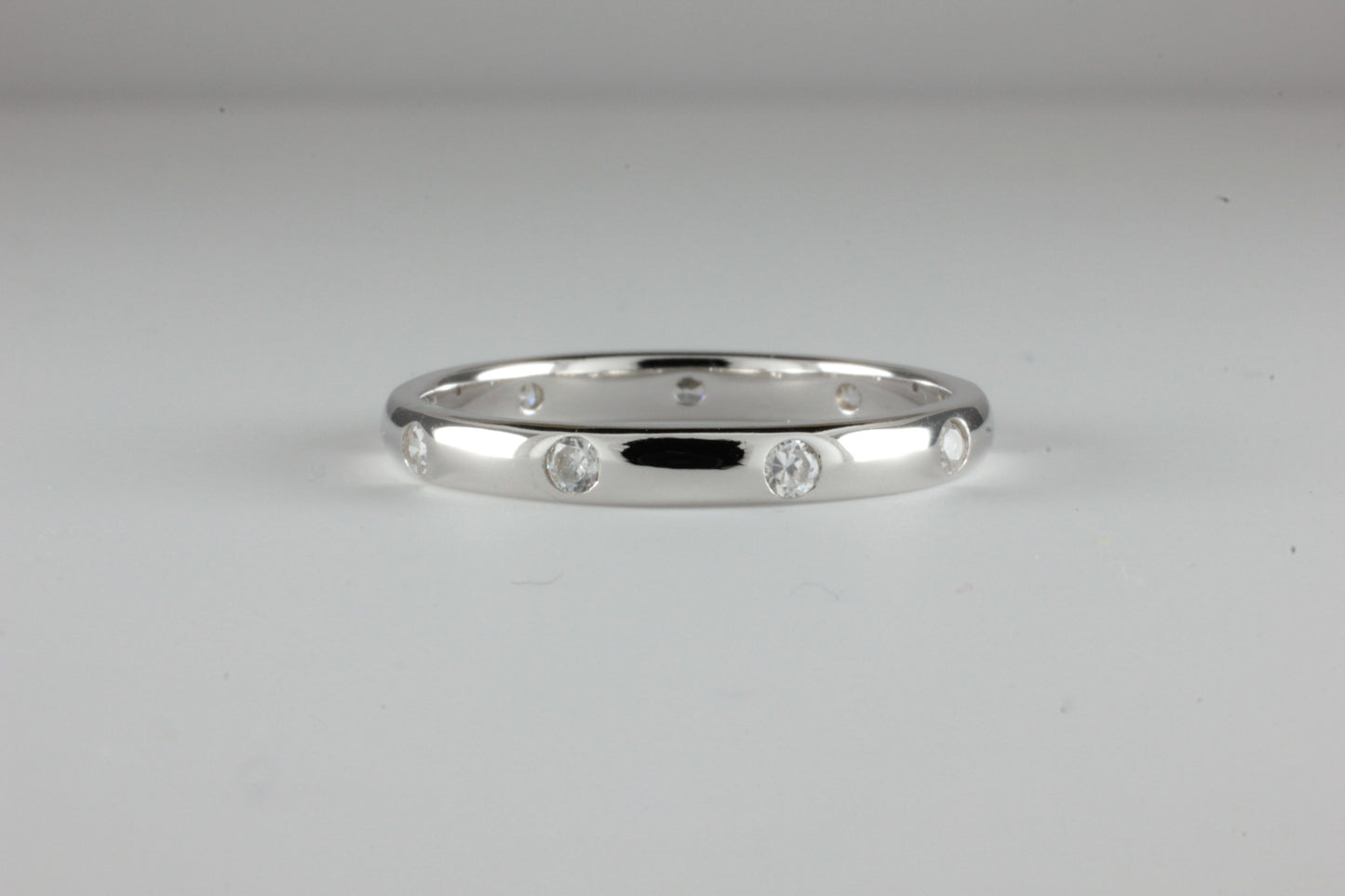 3mm Diamond set band Rub over Flush Fully set with 9 Diamonds