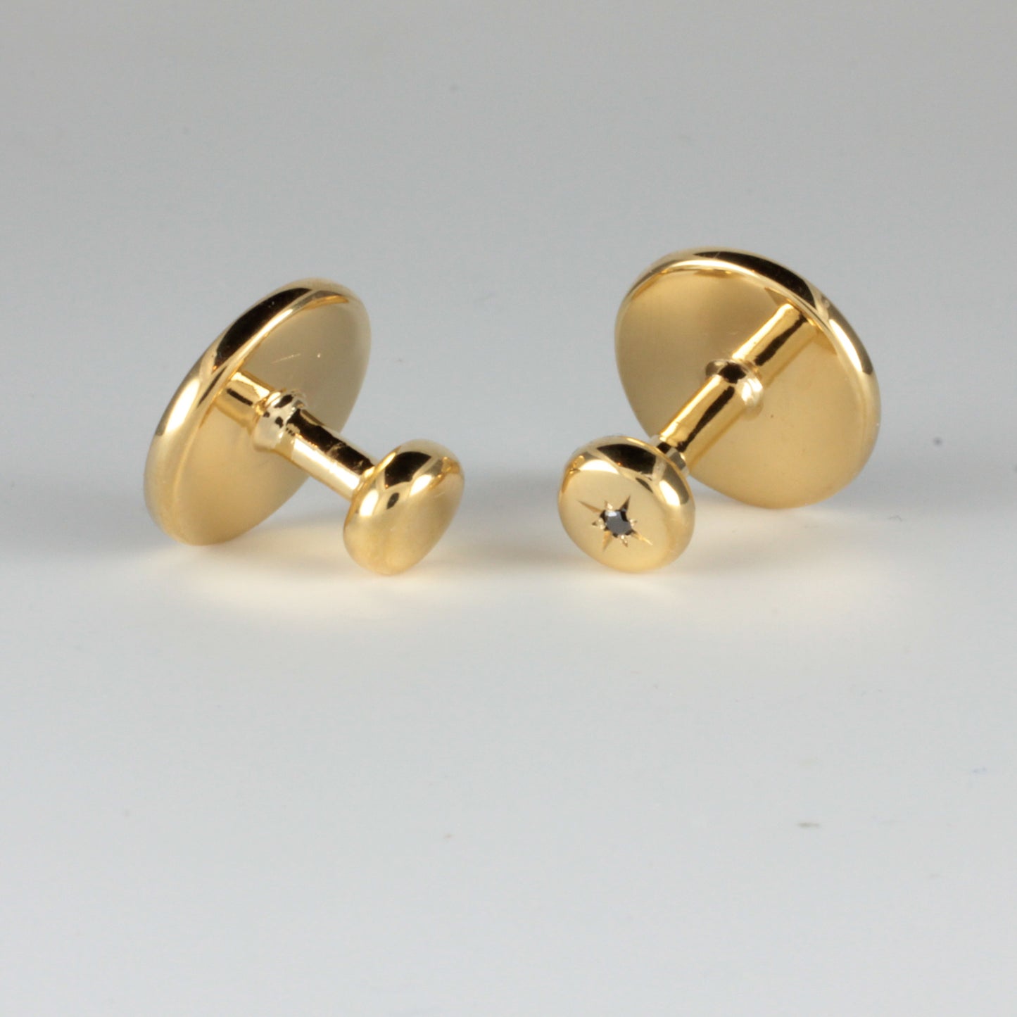 Yellow Gold Collar Studs set with a Black Diamond