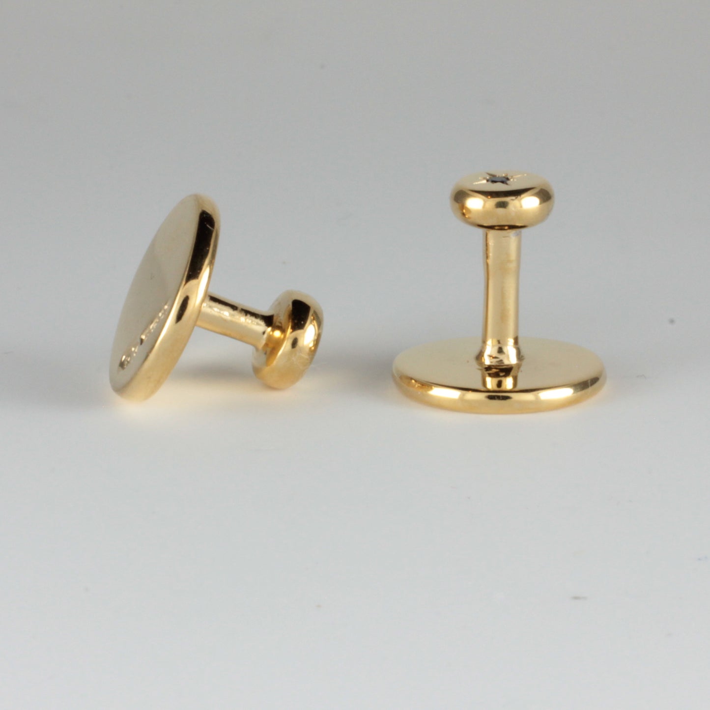 Yellow Gold Collar Studs set with a Black Diamond
