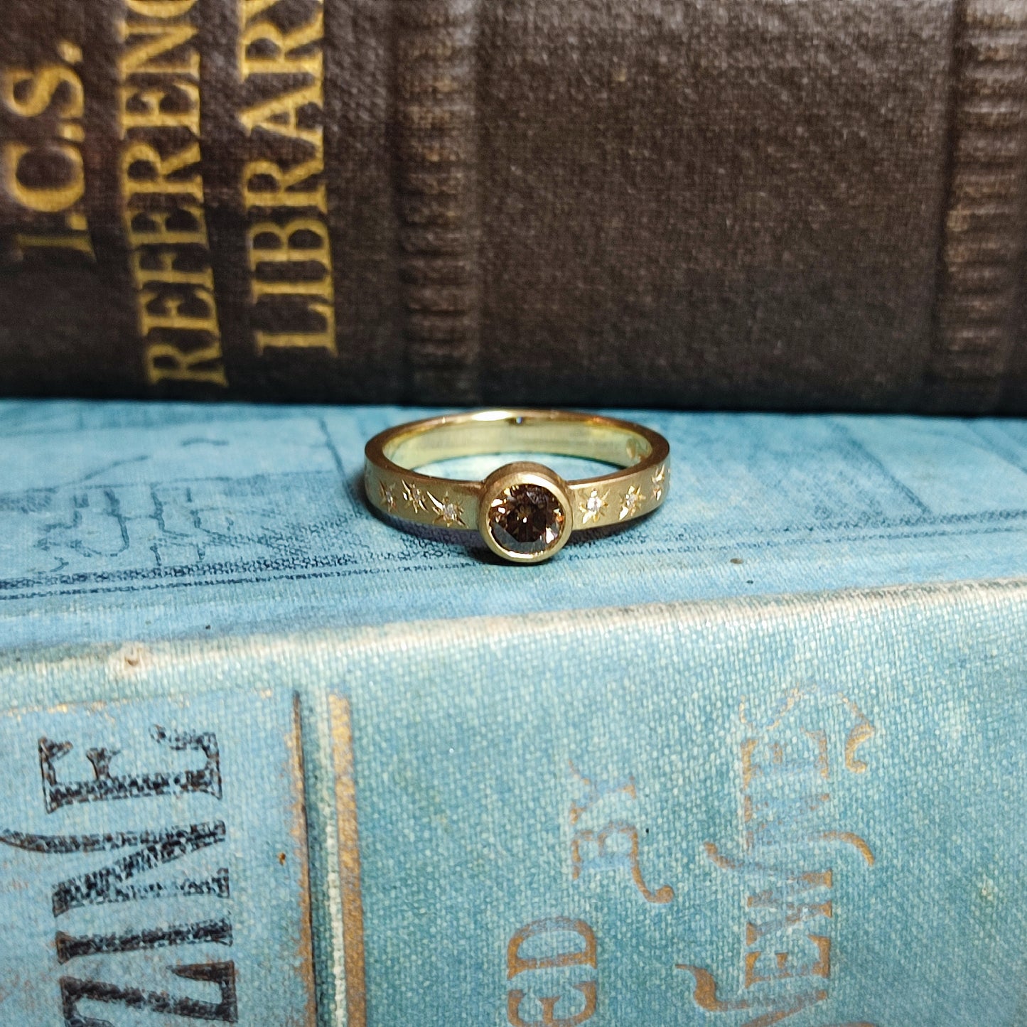 18ct Yellow Gold Rubover Engagement Ring with 0.39ct Fancy Dark Brown Diamond and Star Set Shoulders