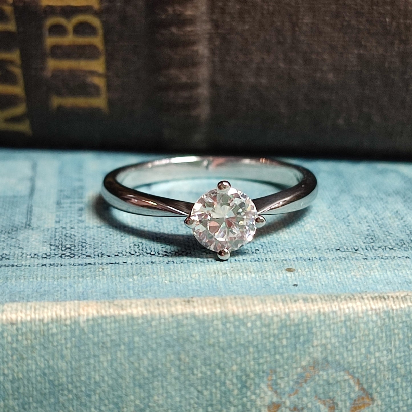 0.60ct Round Brilliant Cut Diamond set in Platinum with 4-claws North/South/East/West