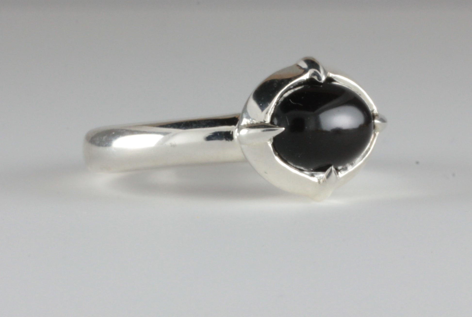 'Coria' Ancient style Silver & Oval Onyx Cabochon Claw Ring