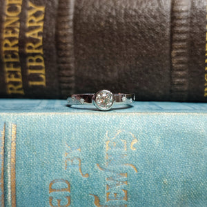 Platinum Rubover Engagement Ring with 0.40ct Diamond and Star Set Shoulders