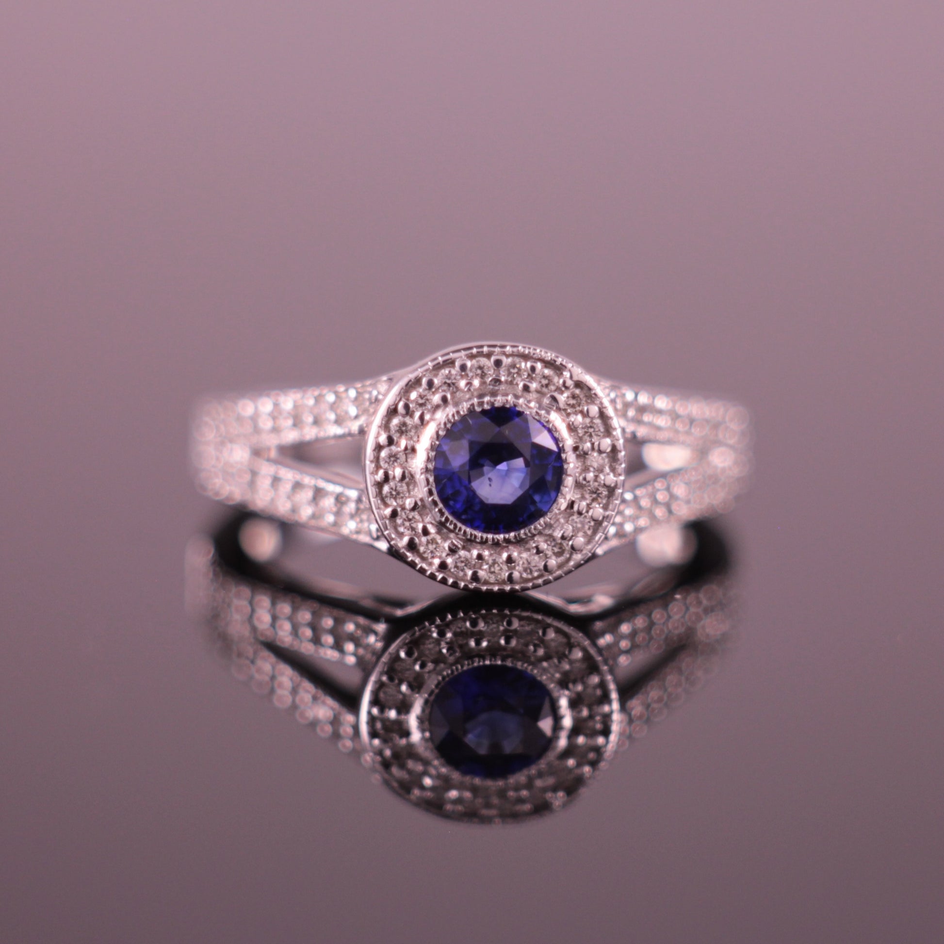 Sapphire & Diamond Halo Engagement Ring in 18ct White Gold Round Brilliant cut 0.42ct Sapphire & 0.28ct Diamond Halo